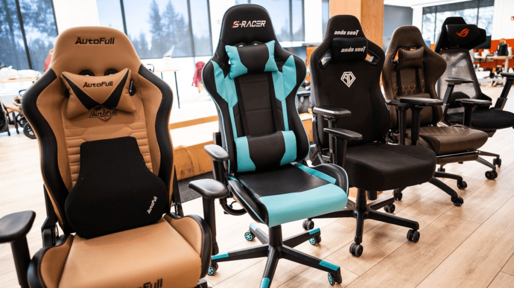Multiple gaming chair models displayed side by side for feature comparison