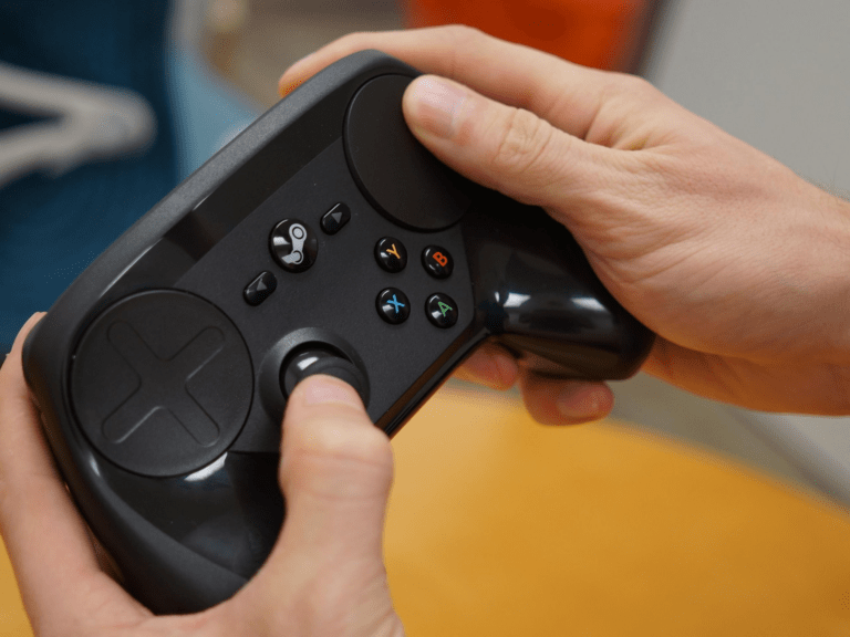 PC gamer holding controller during immersive action gameplay session